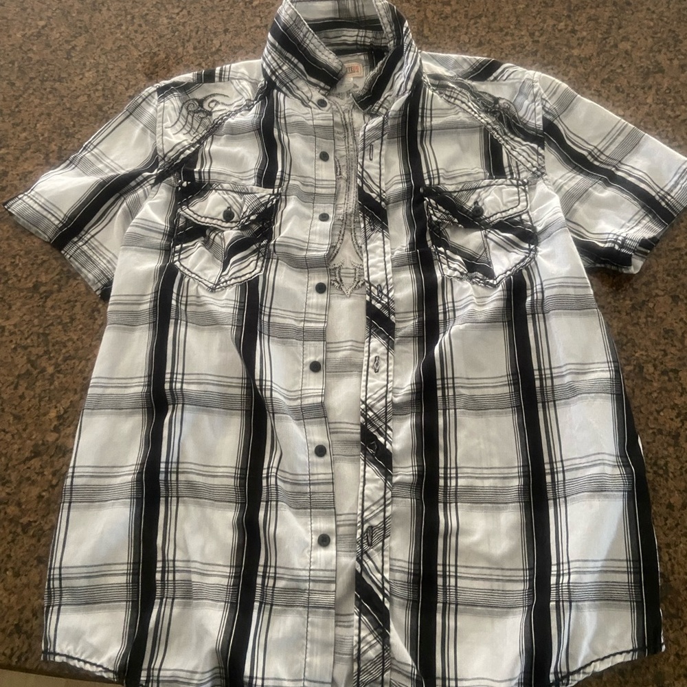Selling a short sleeve flannel y2k style